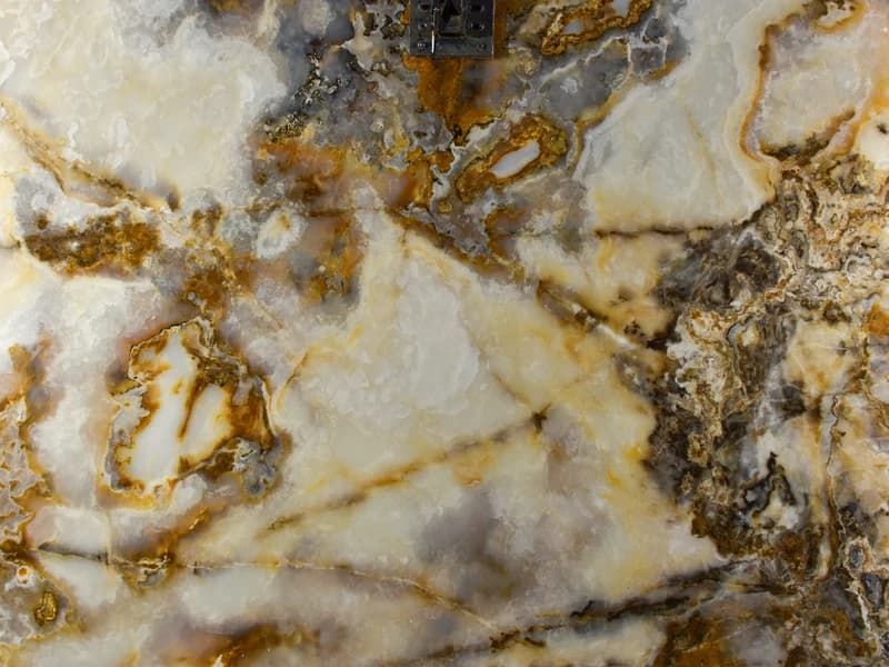 Onyx vs. Marble: Durability, Translucency, and Maintenance Compared